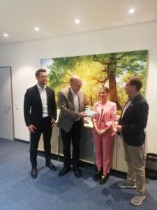 Zukunftswerkstatt Nachhaltige Finanzberatung 2023 in Düsseldorf Bild mit Gastgeber vigo Krankenversicherung